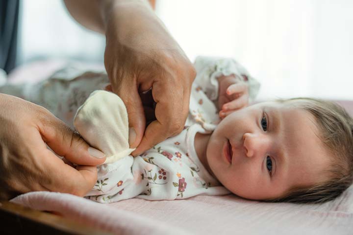 Putting mittens on babies' hands may prevent them from pulling ears